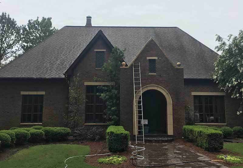 Image: Jackson MS Roof Cleaning Company, Priority Exterior Cleaning, LLC, cleaning a Jackson MS area home.